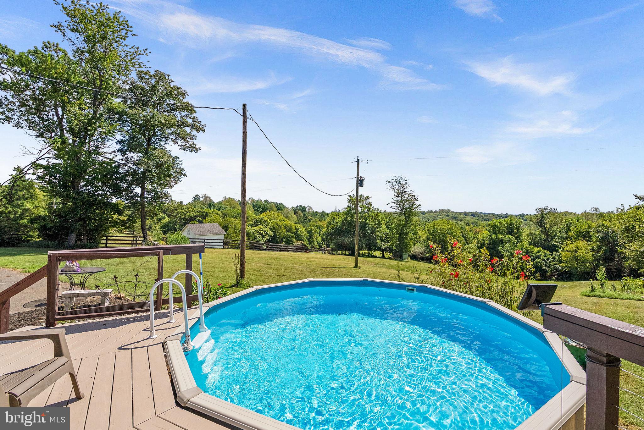 39857 Thomas Mill Road Leesburg, VA 20175 - Photo 9 of 86 Enjoy the incredible views from your pool.
