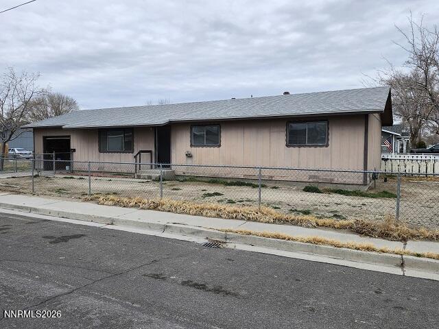 185 Ferguson Street Fallon, NV 89406 - Photo 1 of 5 a front view of a house with a yard