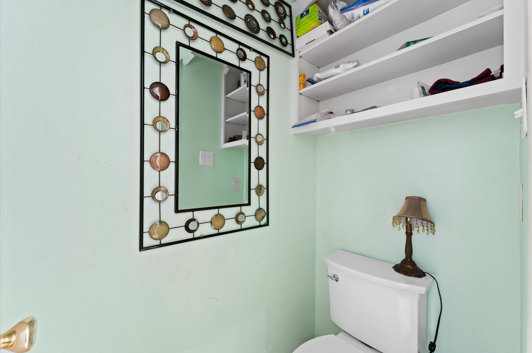 707 Doncrest Street Channelview, TX 77530 - Photo 16 of 27 a bathroom with a sink and mirror