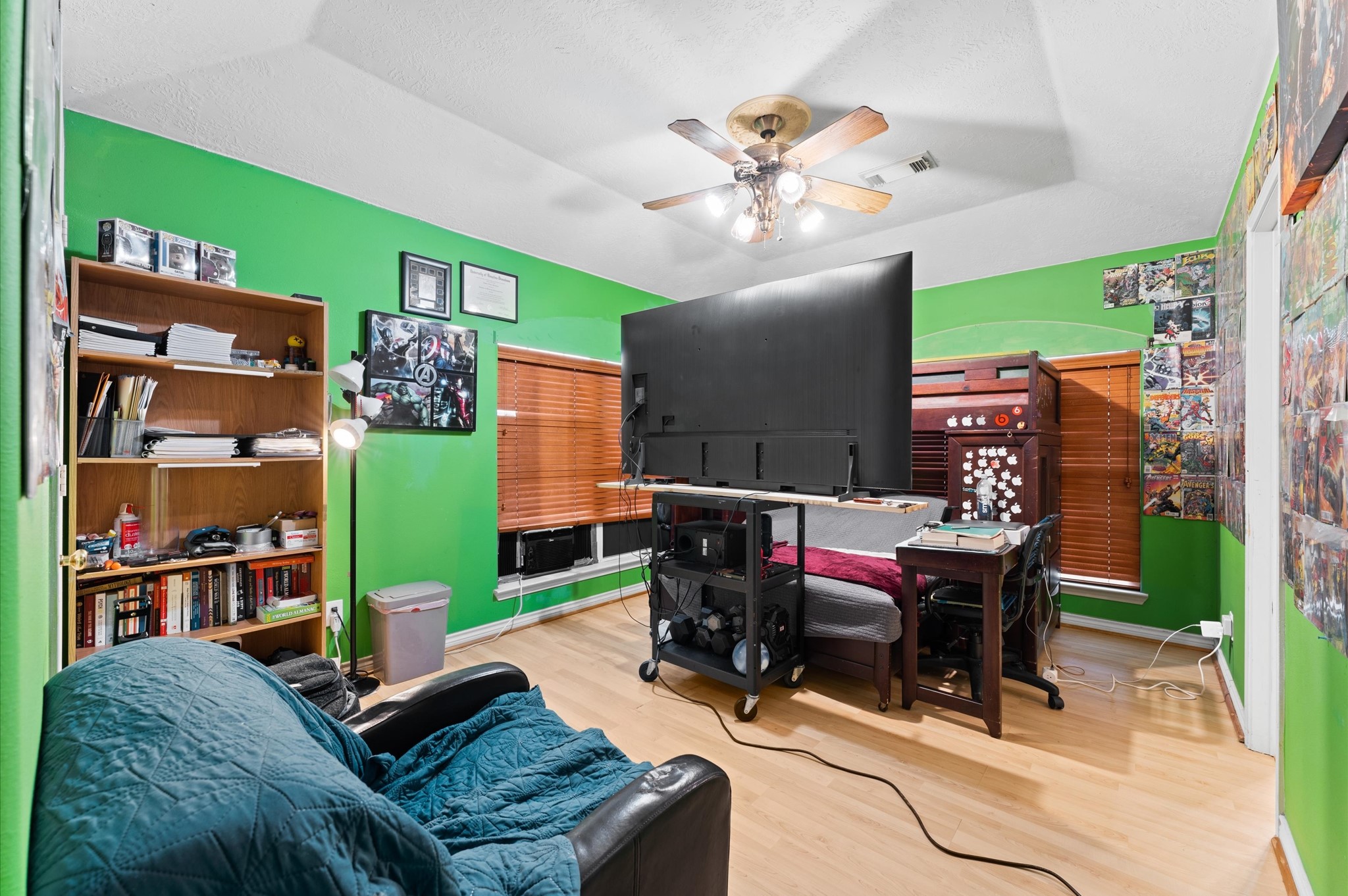 707 Doncrest Street Channelview, TX 77530 - Photo 21 of 27 a view of a livingroom with furniture and a bookshelf
