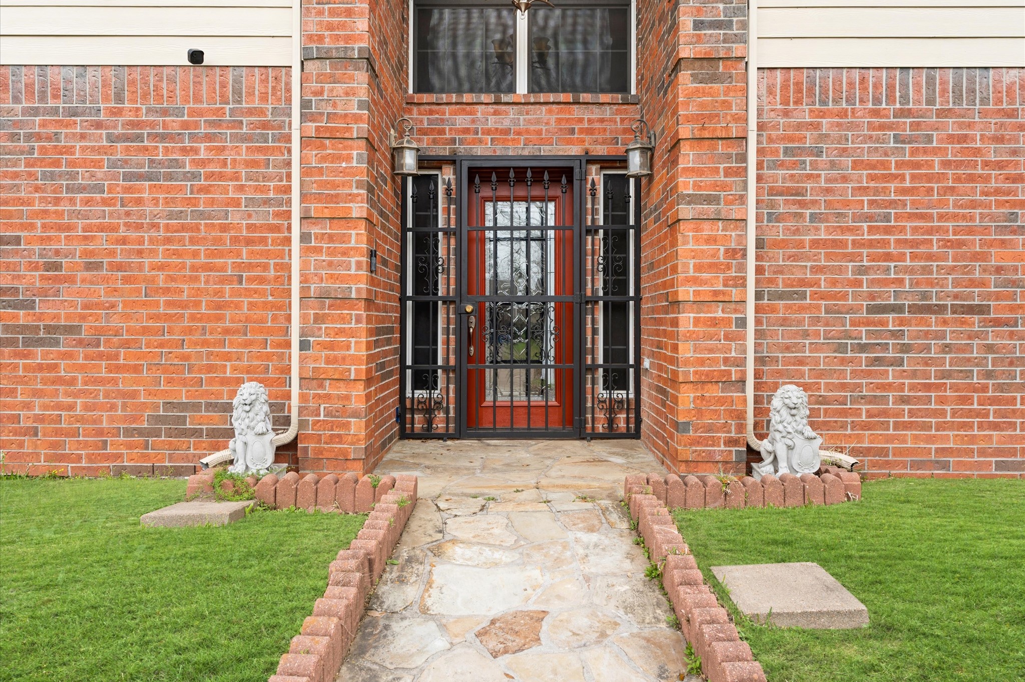 707 Doncrest Street Channelview, TX 77530 - Photo 3 of 27 a front view of a house with a garden