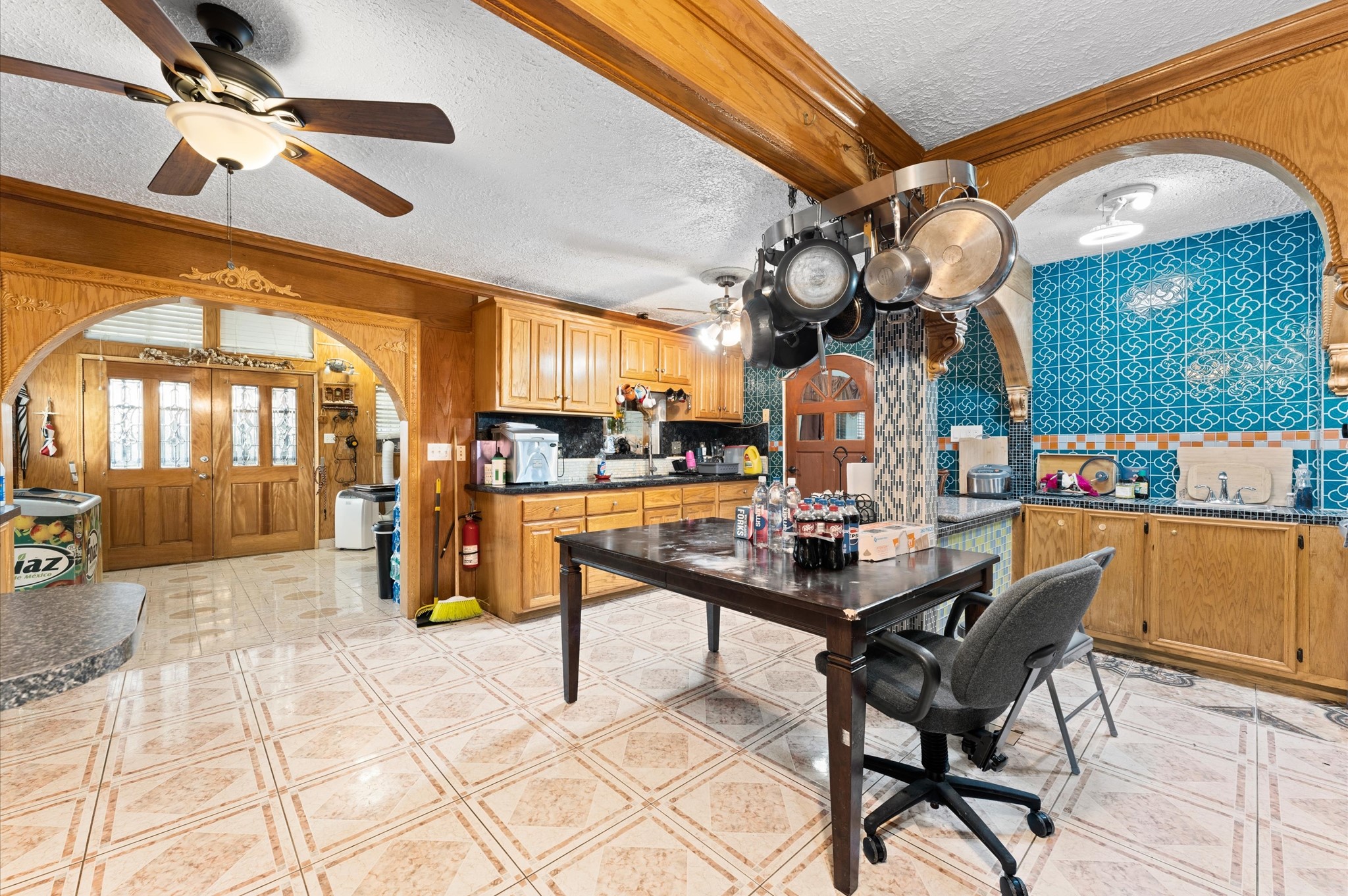 707 Doncrest Street Channelview, TX 77530 - Photo 9 of 27 a view of a dining room with furniture and chandelier
