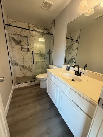 a bathroom with a sink and mirror