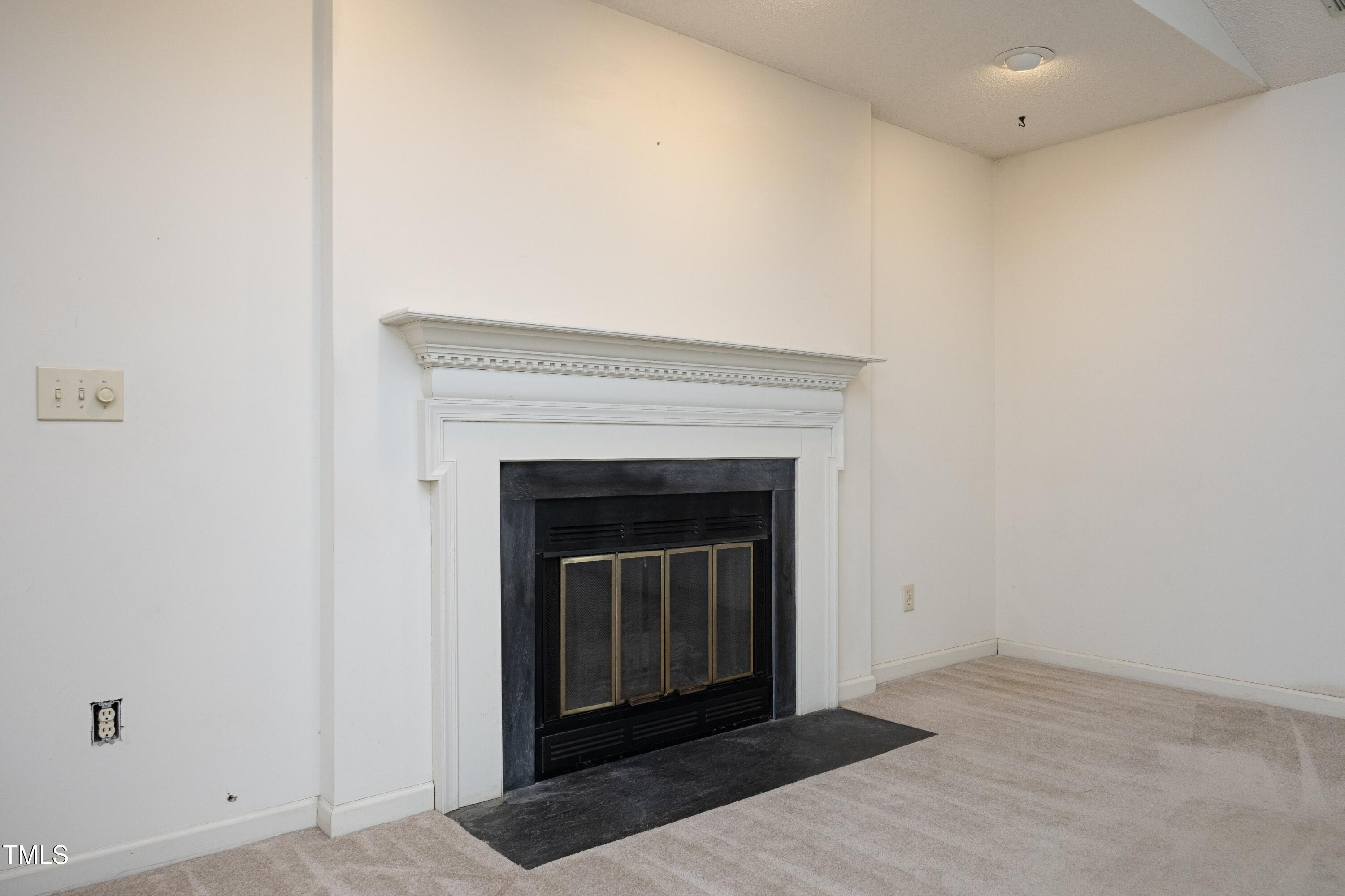 2710 Cottage Circle Raleigh, NC 27613 - Photo 11 of 36 Fireplace in Family Room