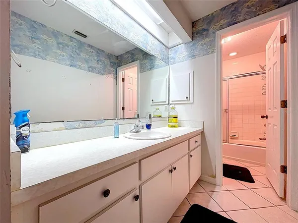 a bathroom with a sink and a bathtub