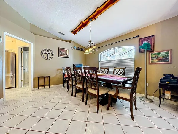 a view of a dining room with furniture