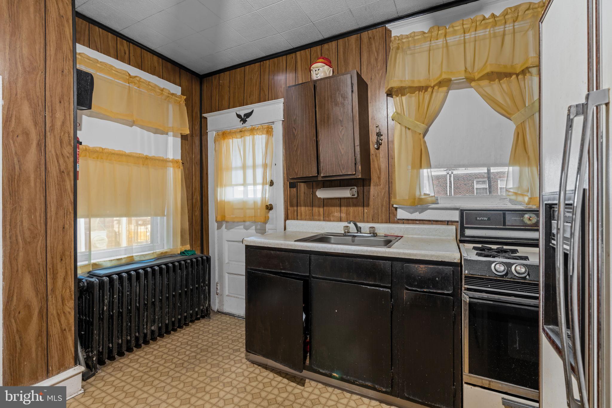6520 Marsden Street Philadelphia, PA 19135 - Photo 13 of 26 a kitchen with a sink and a window