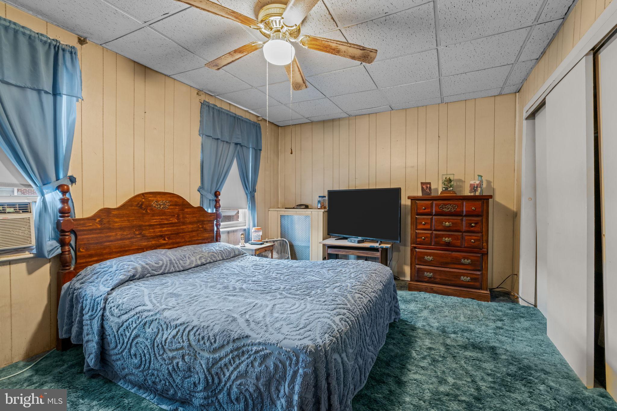 6520 Marsden Street Philadelphia, PA 19135 - Photo 17 of 26 a bedroom with a bed and furniture