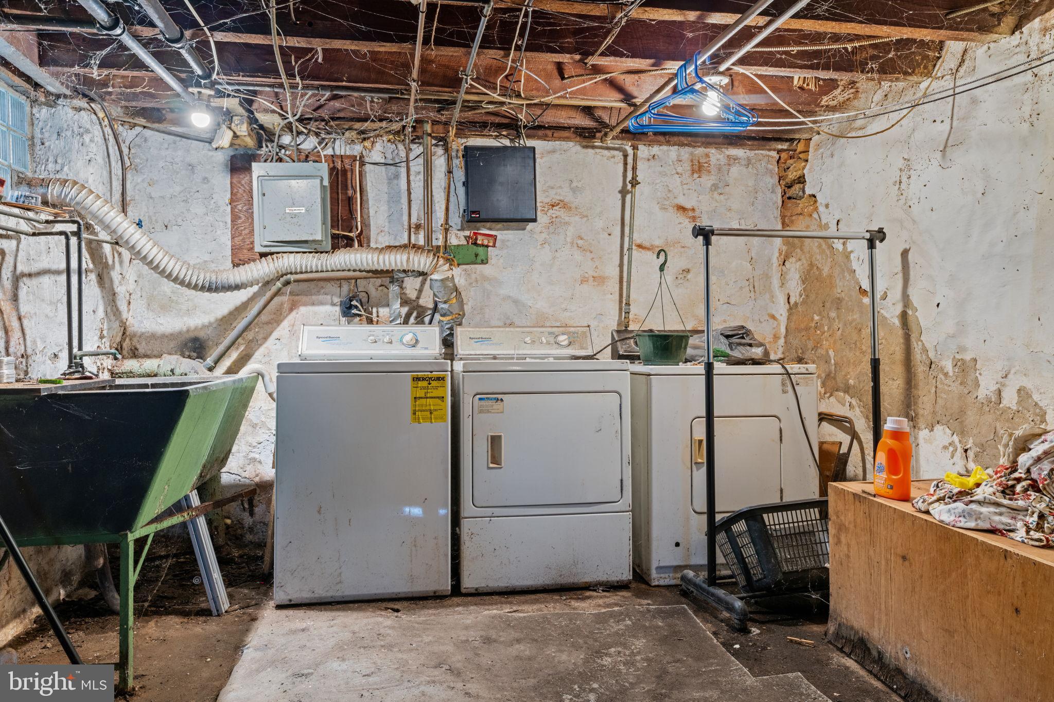 6520 Marsden Street Philadelphia, PA 19135 - Photo 23 of 26 a utility room with dryer and washer