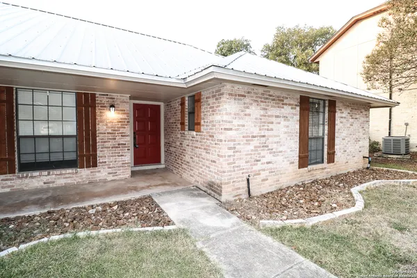 a front view of a house with a garage