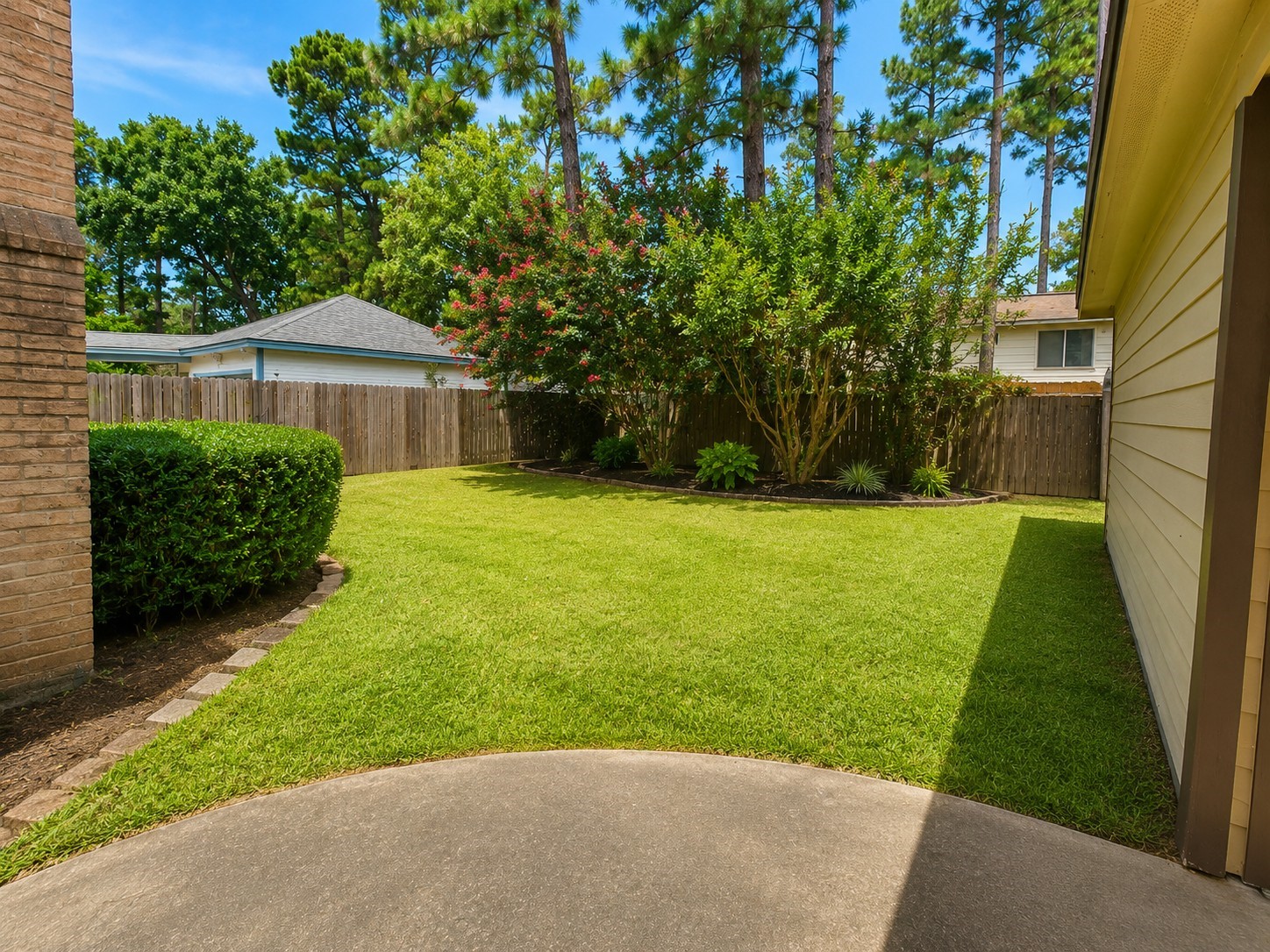 5518 Lacreek Lane Spring, TX 77379 - Photo 29 of 29 BACKYARD - Fully fenced backyard with mature trees and plenty of green space, offering room to relax, play or create your own outdoor retreat.