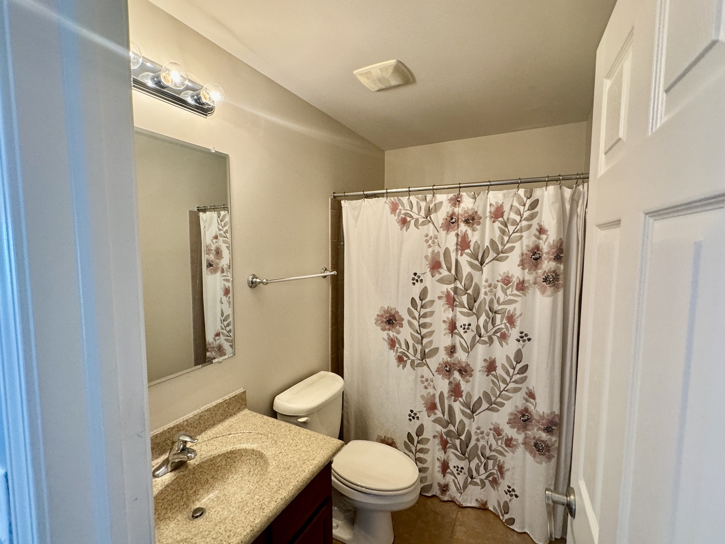 423 Acushnet Street, Unit 423 Elgin, IL 60124 - Photo 13 of 20 a bathroom with a sink toilet and shower