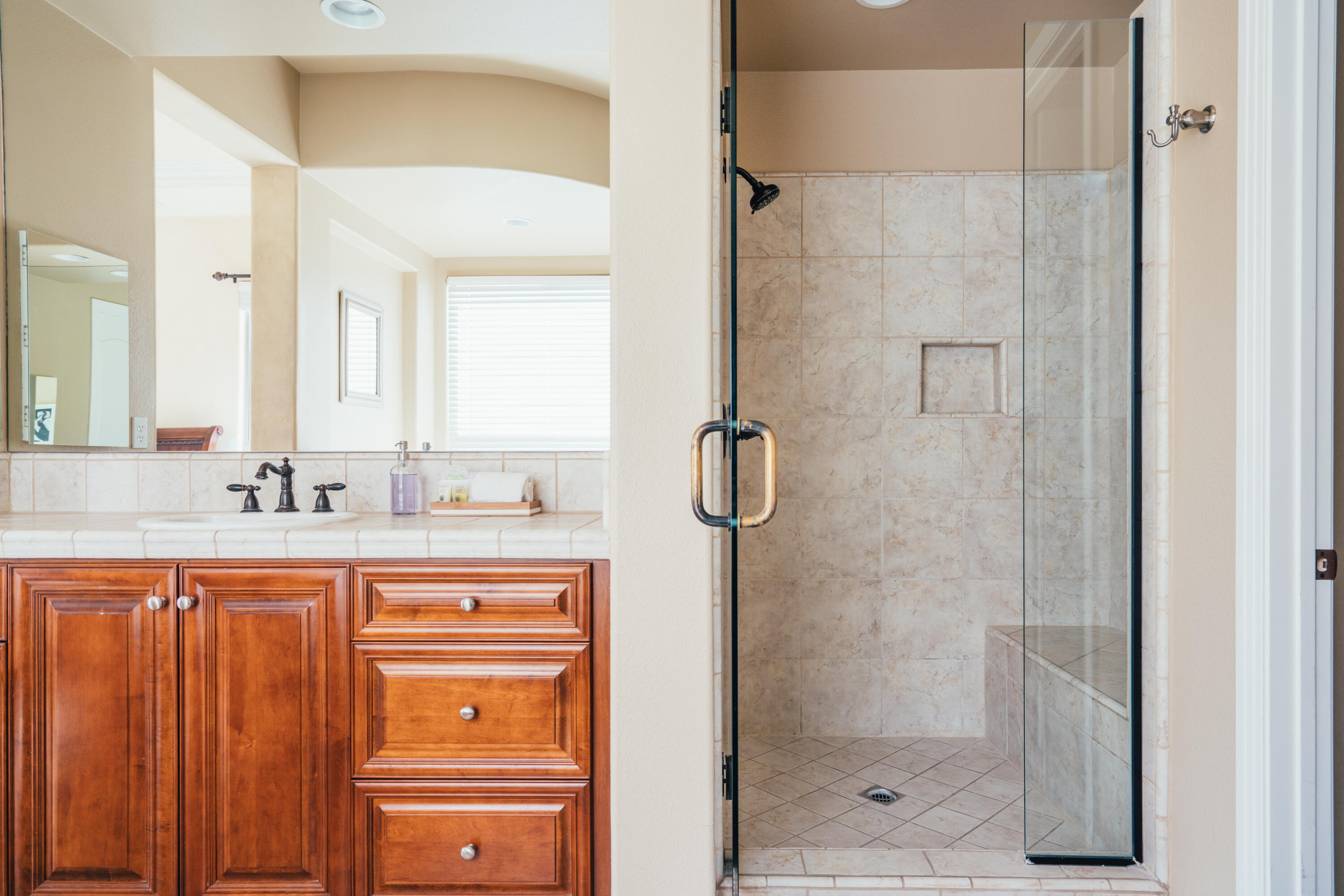 48789 Cascade Street Indio, CA 92201 - Photo 17 of 34 a bathroom with a shower and a sink