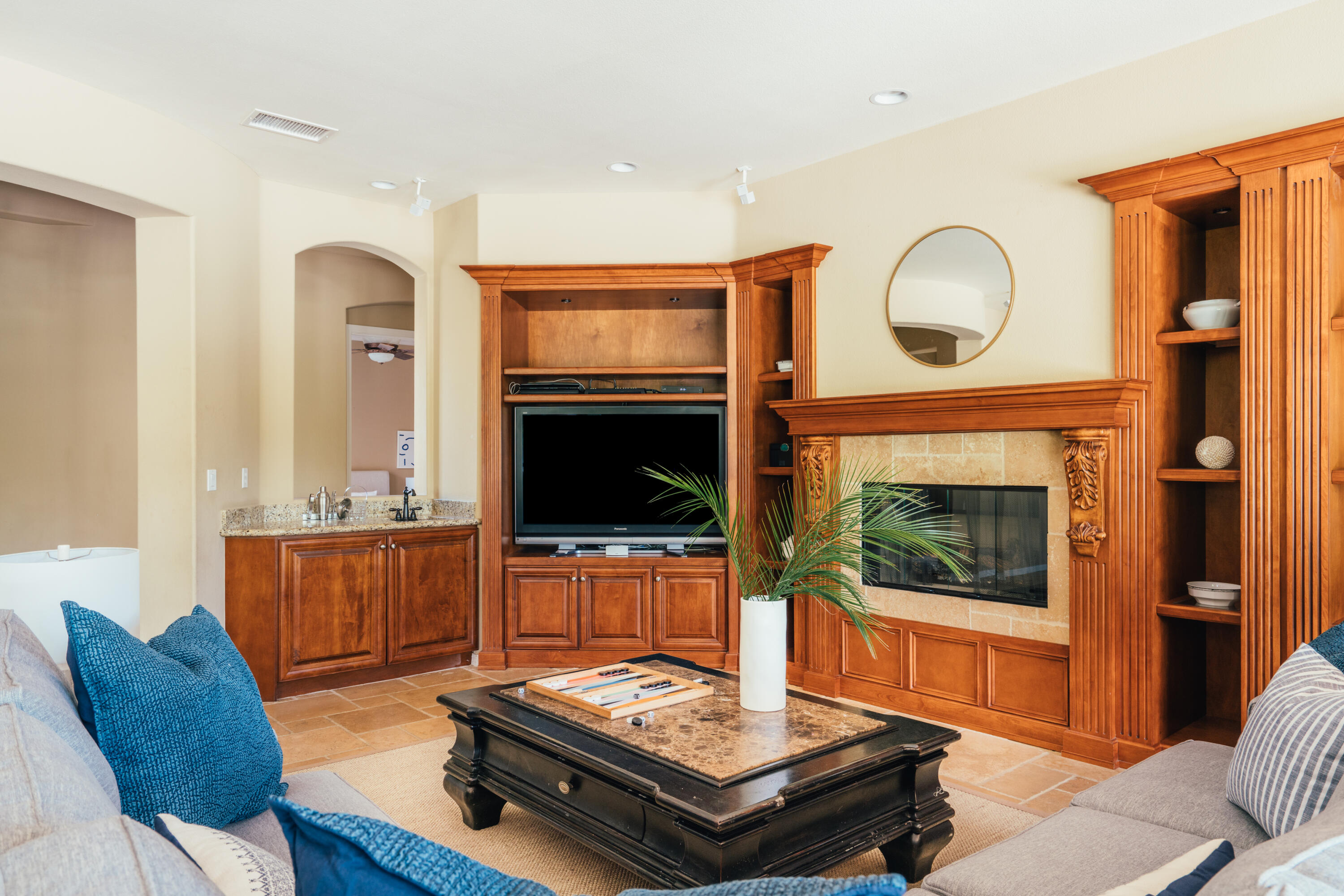 48789 Cascade Street Indio, CA 92201 - Photo 3 of 34 a living room with furniture and a fireplace