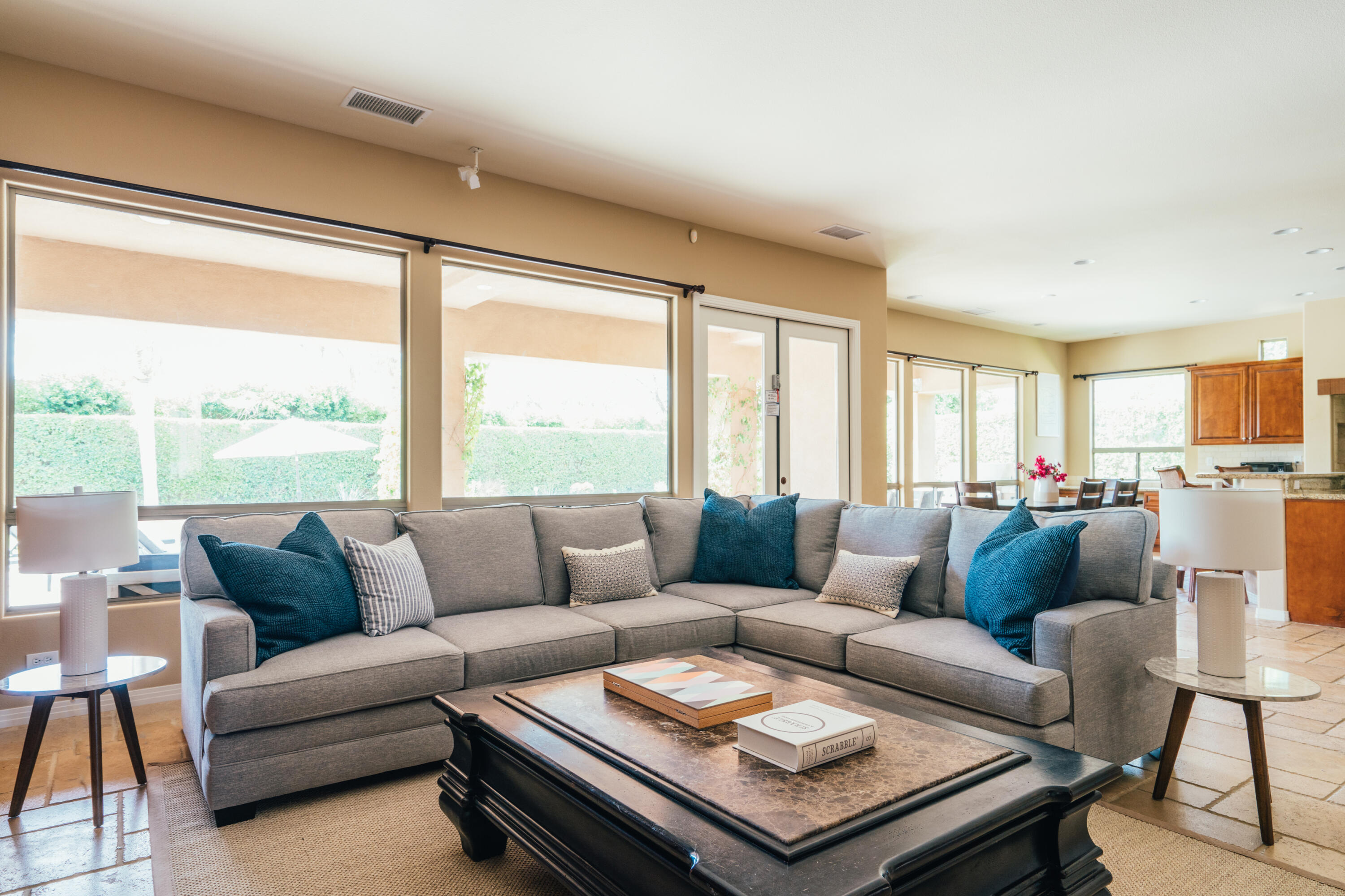 48789 Cascade Street Indio, CA 92201 - Photo 4 of 34 a living room with furniture and a large window