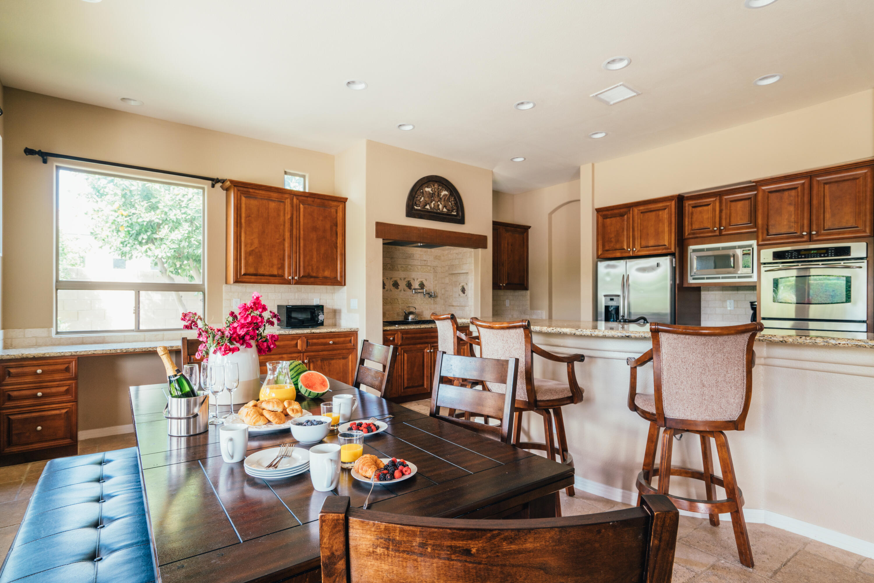 48789 Cascade Street Indio, CA 92201 - Photo 5 of 34 a view of a dining room with furniture and a window