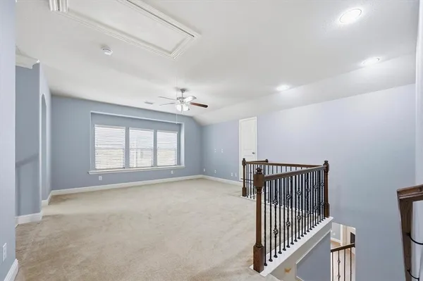 a view of a livingroom with a staircase