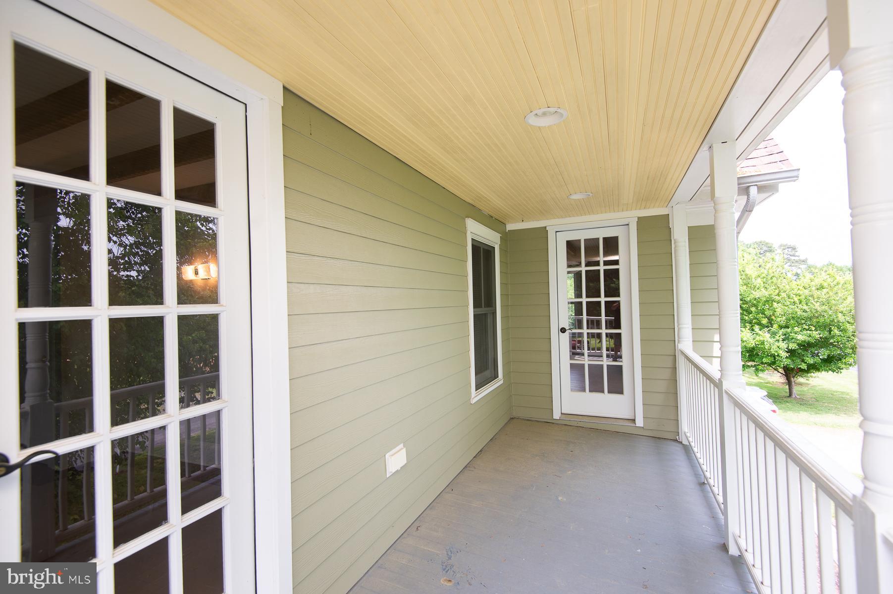 10494 Rich Neck Road Claiborne, MD 21624 - Photo 49 of 80 Third Bedroom Shared Balcony