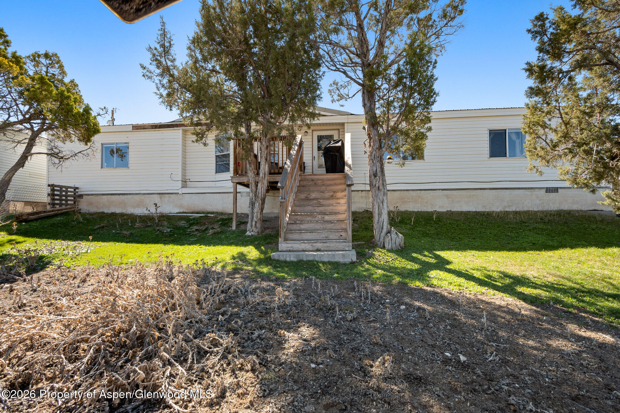 301 County Road 334A Rifle, CO 81650 - Photo 1 of 26 a view of a house with pool and a yard