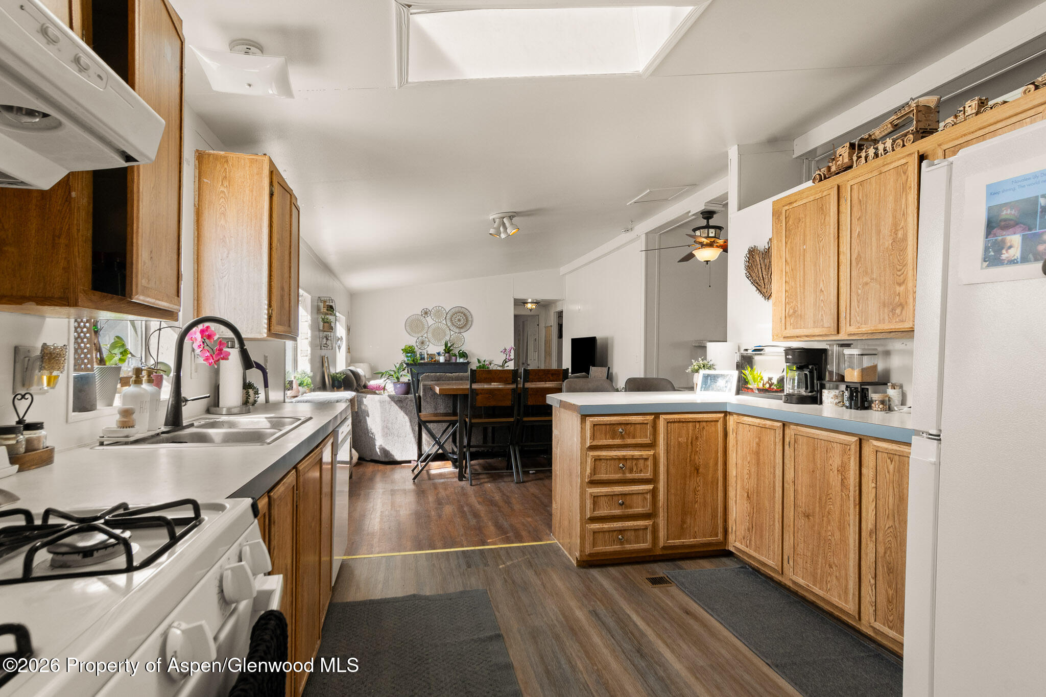 301 County Road 334A Rifle, CO 81650 - Photo 12 of 26 a kitchen with counter top space and appliances