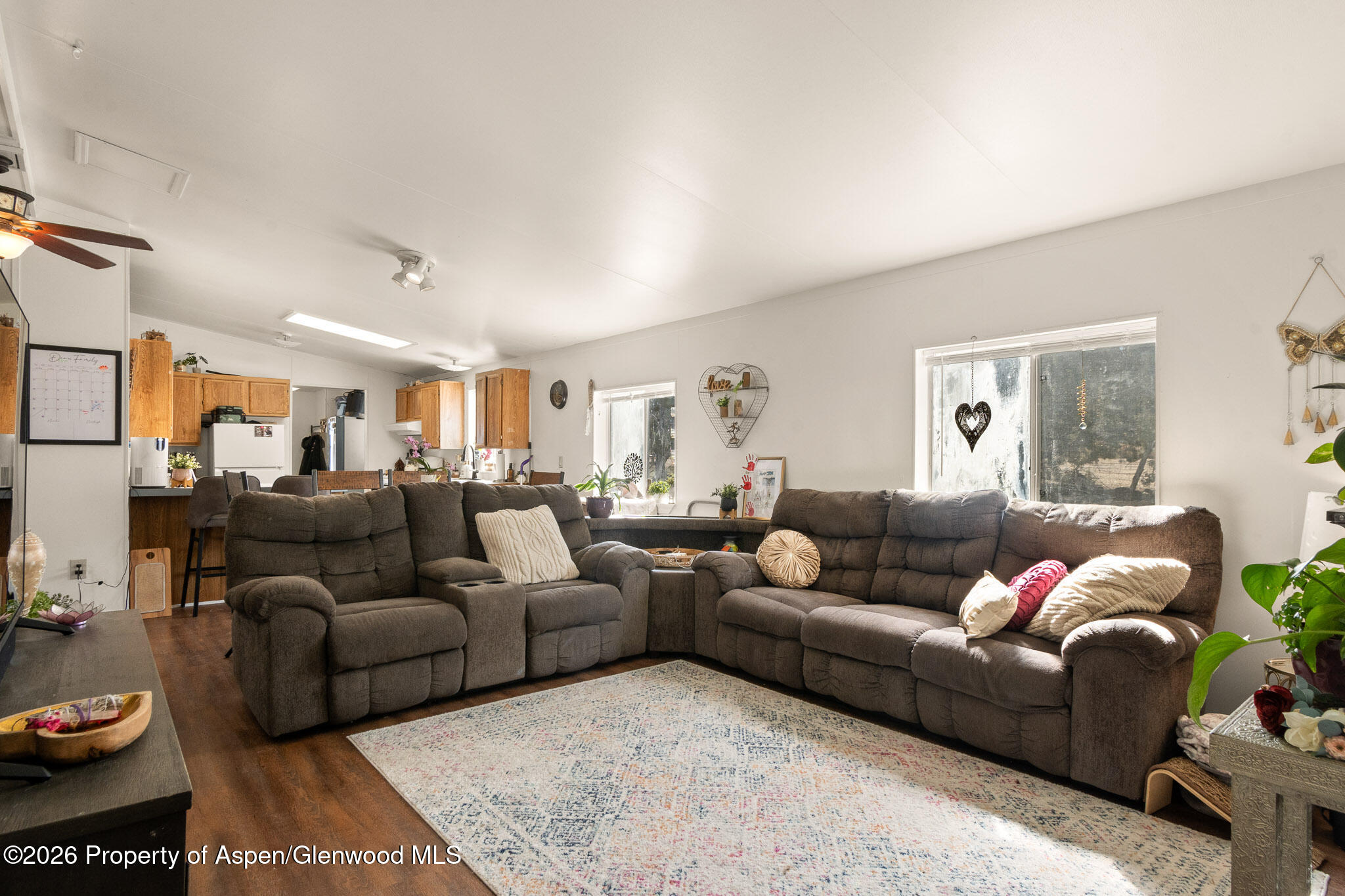 301 County Road 334A Rifle, CO 81650 - Photo 15 of 26 a living room with furniture and a rug