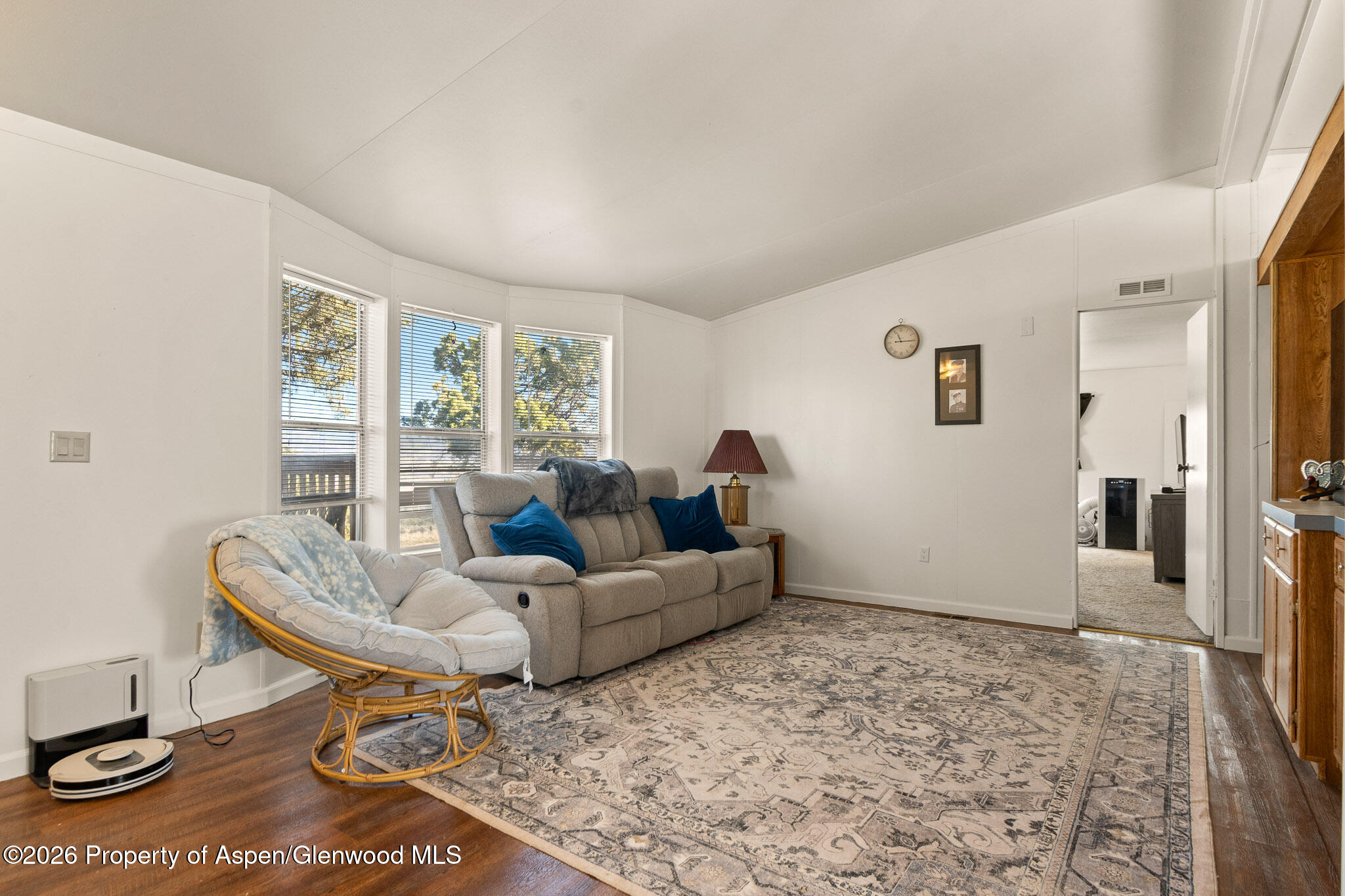 301 County Road 334A Rifle, CO 81650 - Photo 22 of 26 a living room with furniture and a large window
