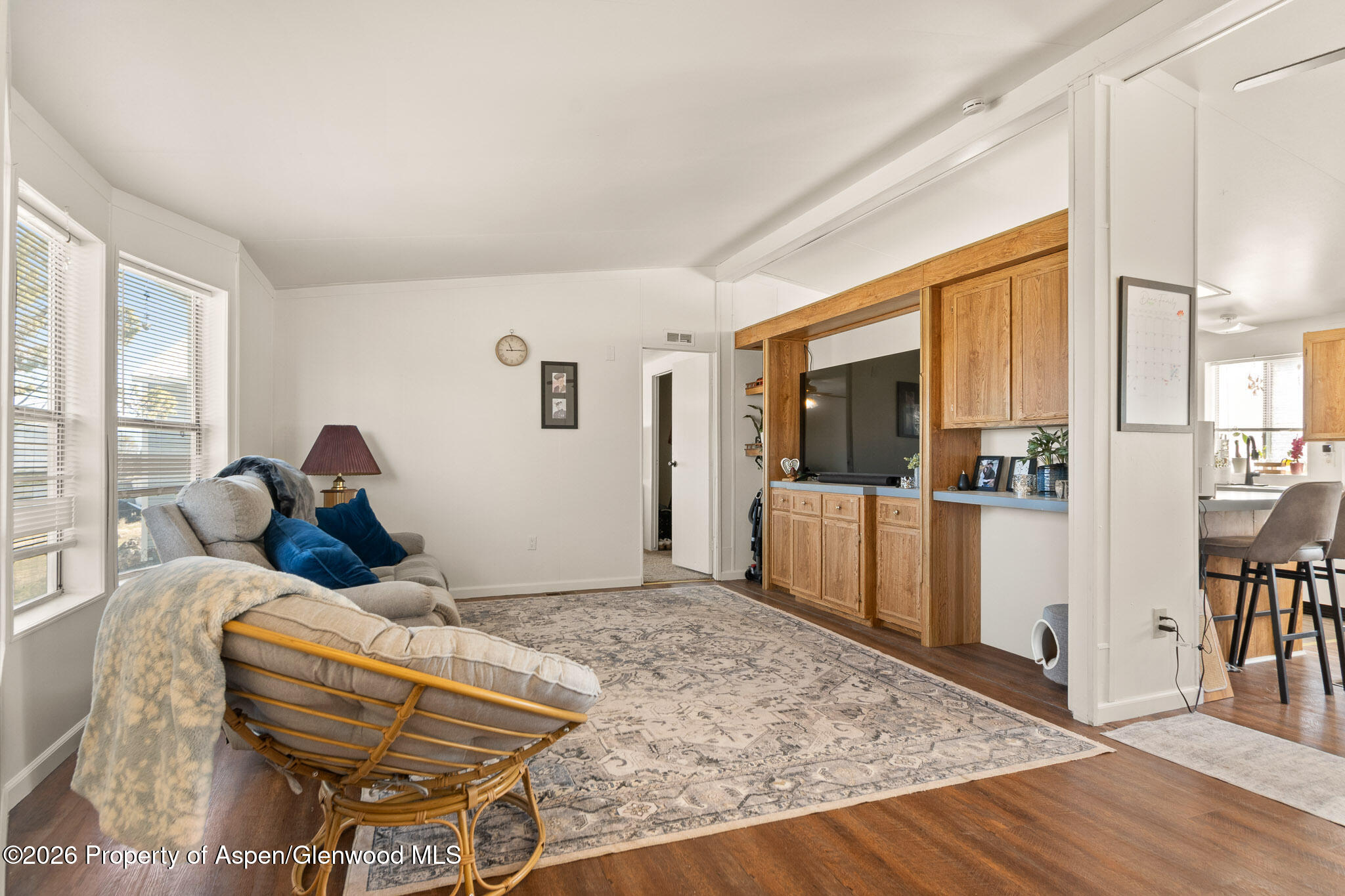 301 County Road 334A Rifle, CO 81650 - Photo 23 of 26 a bedroom with a bed and wooden floor