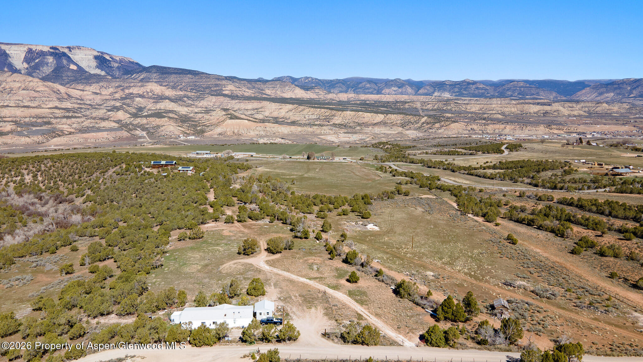 301 County Road 334A Rifle, CO 81650 - Photo 26 of 26 a view of a city with mountains in the background