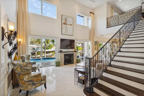 a livingroom with furniture staircase and a living room