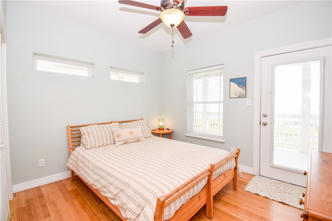 2006 1st Street Bayside, TX 78340 - Photo 24 of 37 a bedroom with a bed and window