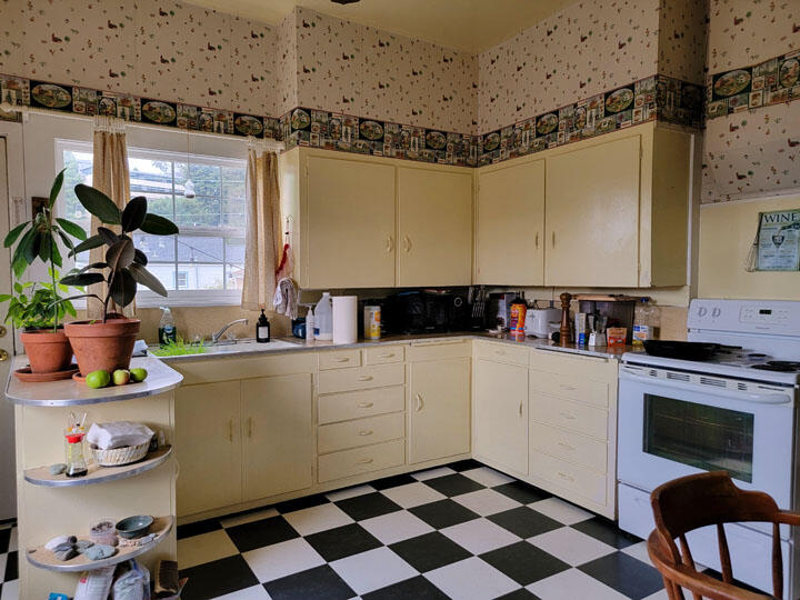 120 13th Street Arcata, CA 95521 - Photo 33 of 37 a kitchen with a stove a sink and a refrigerator
