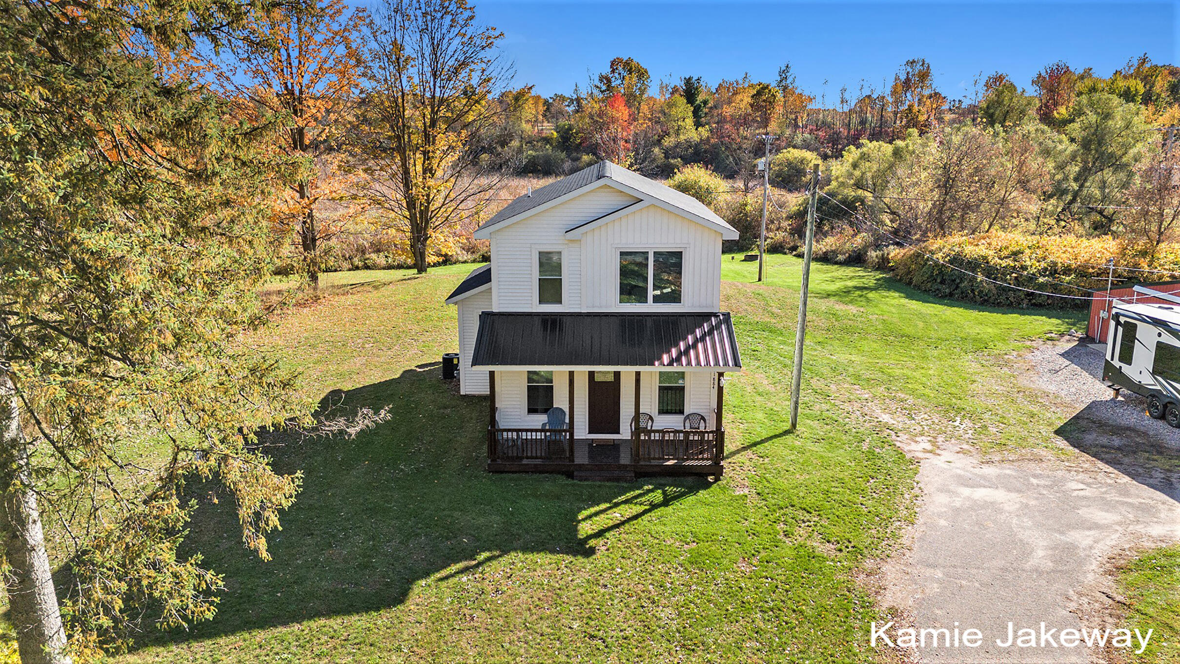 11884 Old Belding Road Northeast Belding, MI 48809 - Photo 4 of 42 DJI_20251020154525_0022_D