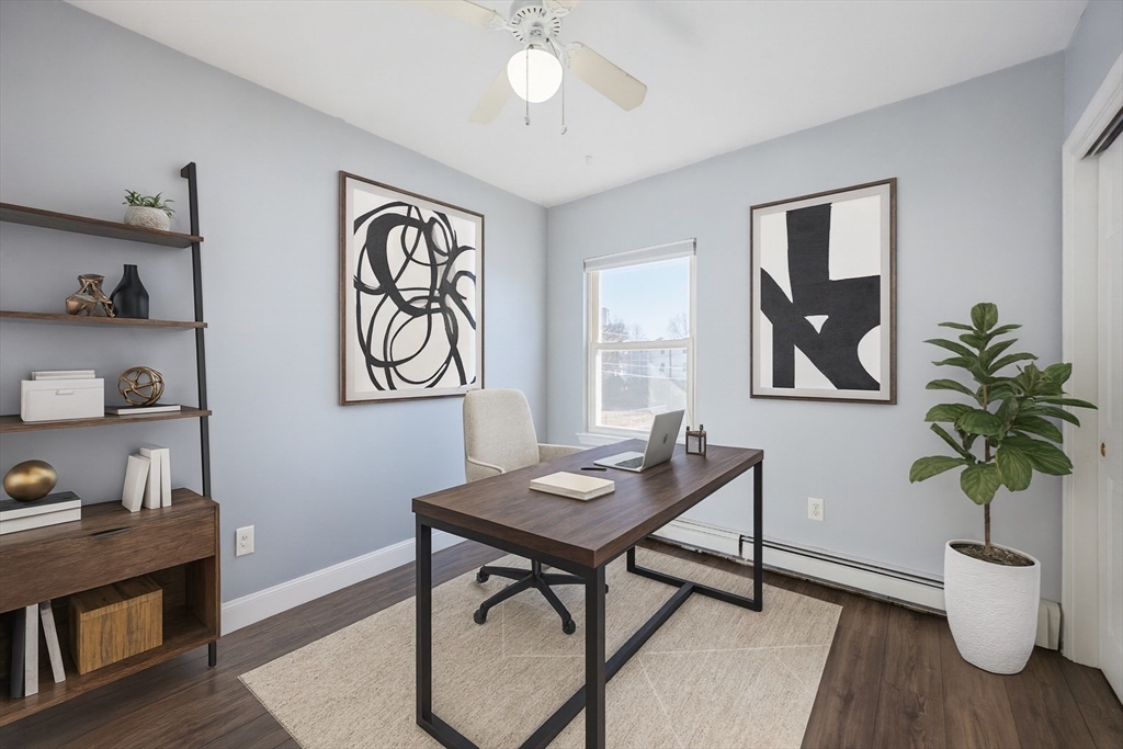 35 Hazel Street, Unit B Attleboro, MA 02703 - Photo 15 of 33 a view of a workspace with furniture and a potted plant