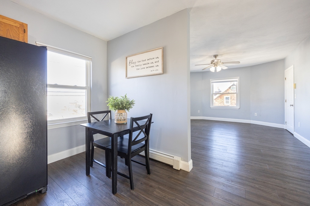 35 Hazel Street, Unit B Attleboro, MA 02703 - Photo 6 of 33 a view of a dining room with furniture and wooden floor