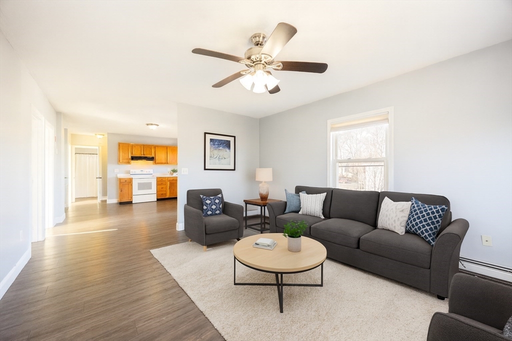 35 Hazel Street, Unit B Attleboro, MA 02703 - Photo 8 of 33 a living room with furniture and a large window