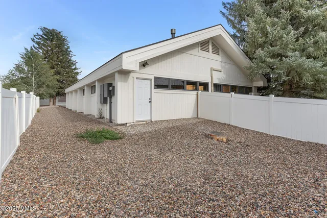 a view of a hallway with seating space