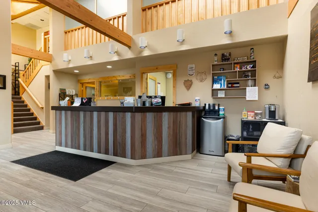 a utility room with sink dryer and washer