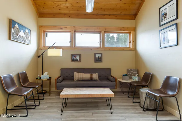 a view of a balcony with chairs