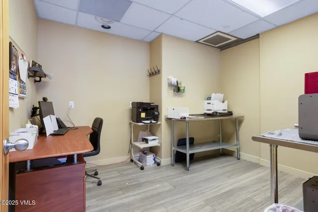 a view of a swimming pool with seating area