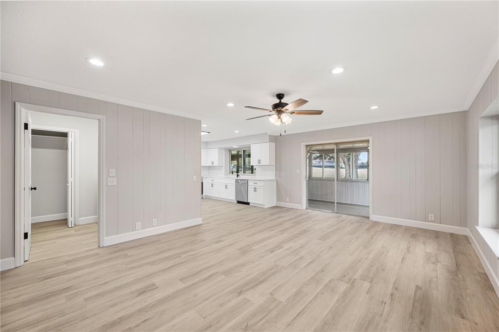 241 Greenfield Road Winter Haven, FL 33884 - Photo 7 of 43 wooden floor in an empty room with a window