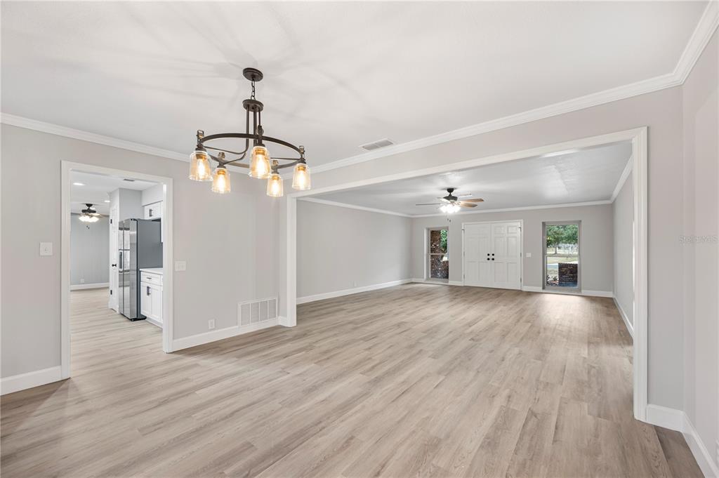 241 Greenfield Road Winter Haven, FL 33884 - Photo 9 of 43 a view of a room with wooden floor and windows