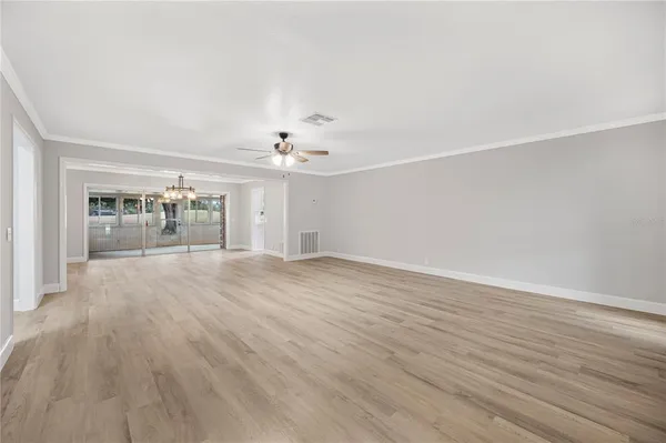 a view of a livingroom with wooden floor