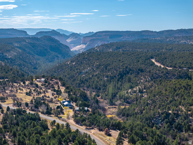6 South N Frk Road Orderville, UT 84758 - Photo 55 of 68 Aerial view of property's location with a mountain backdrop and a heavily wooded area