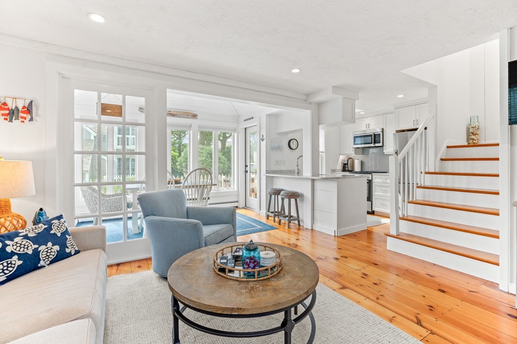 3 Folgers Way, Unit 3 Mashpee, MA 02649 - Photo 11 of 21 a living room with furniture and wooden floor