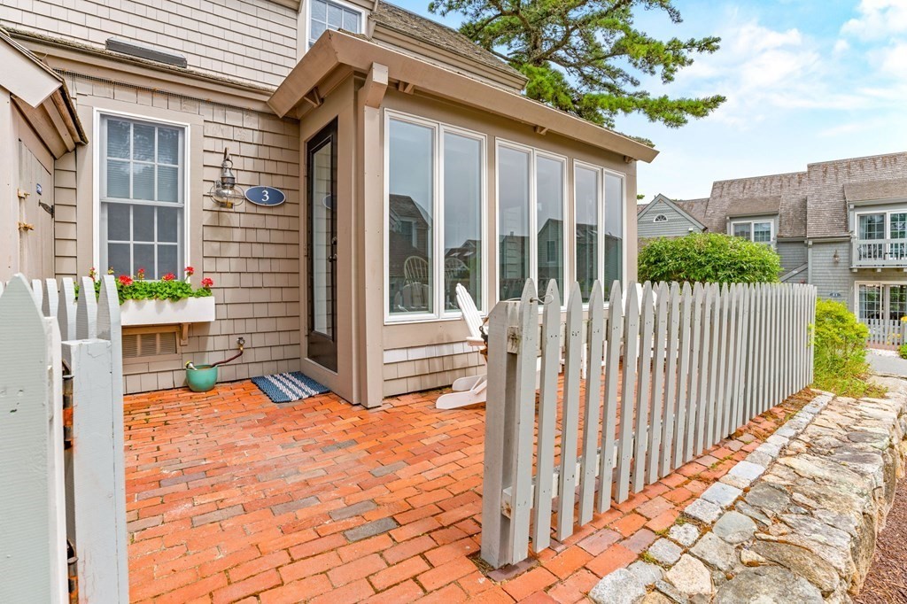 3 Folgers Way, Unit 3 Mashpee, MA 02649 - Photo 3 of 21 a view of a house with backyard and porch
