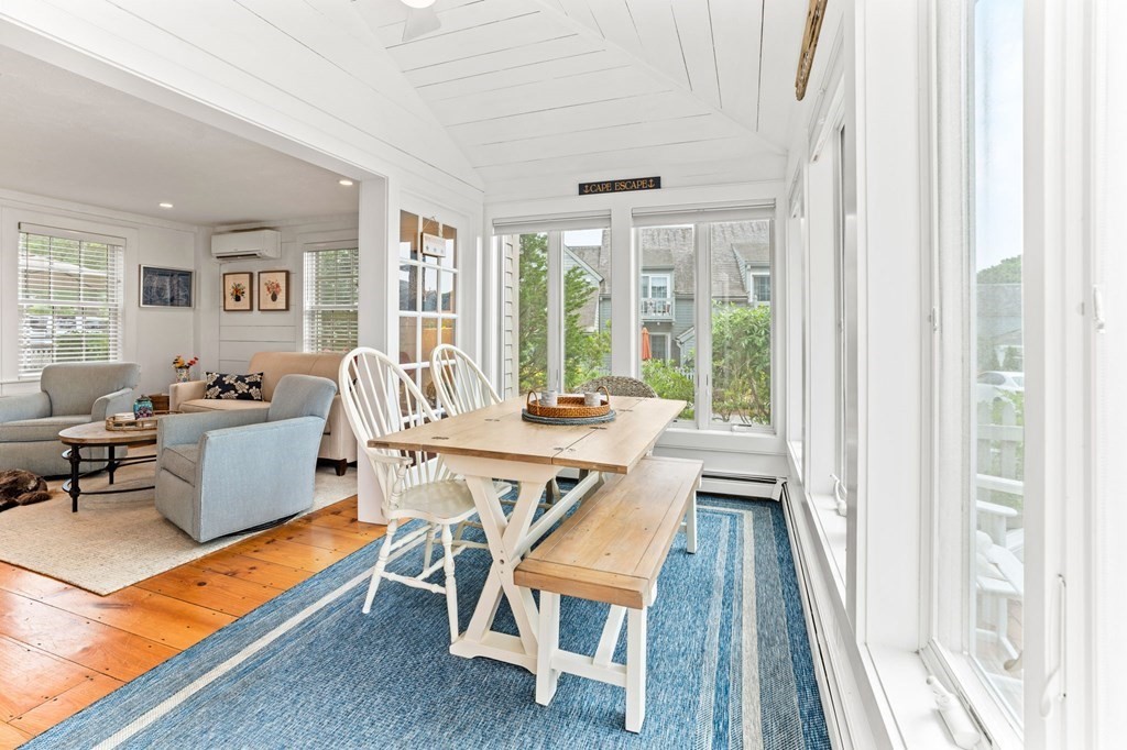 3 Folgers Way, Unit 3 Mashpee, MA 02649 - Photo 4 of 21 a view of a dining room with furniture window and outside view