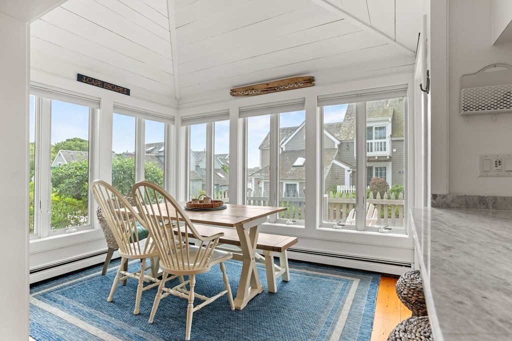 3 Folgers Way, Unit 3 Mashpee, MA 02649 - Photo 6 of 21 a view of a dining room with furniture and windows