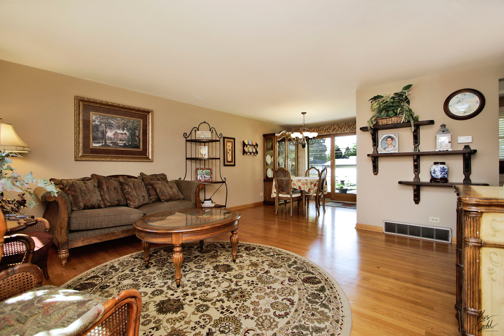 720 Stuart Street Grayslake, IL 60030 - Photo 2 of 19 a living room with furniture and a wooden floor