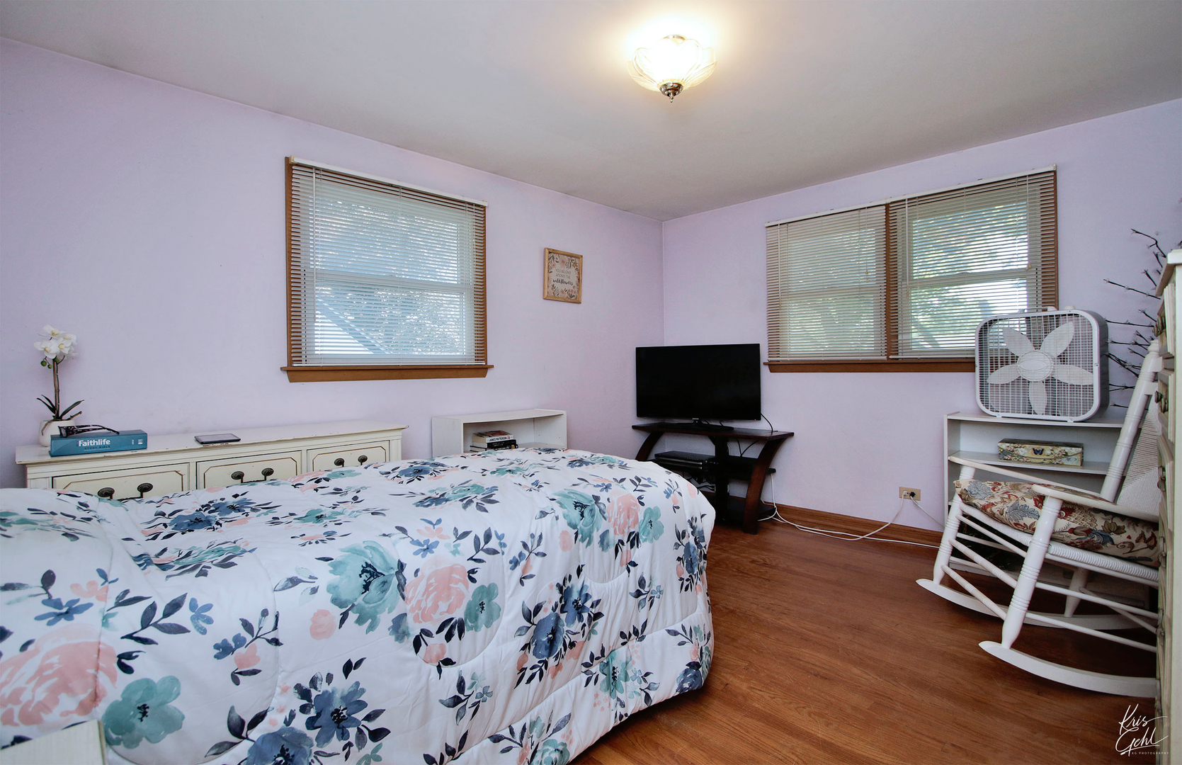 720 Stuart Street Grayslake, IL 60030 - Photo 8 of 19 a bedroom with a bed and wooden floor