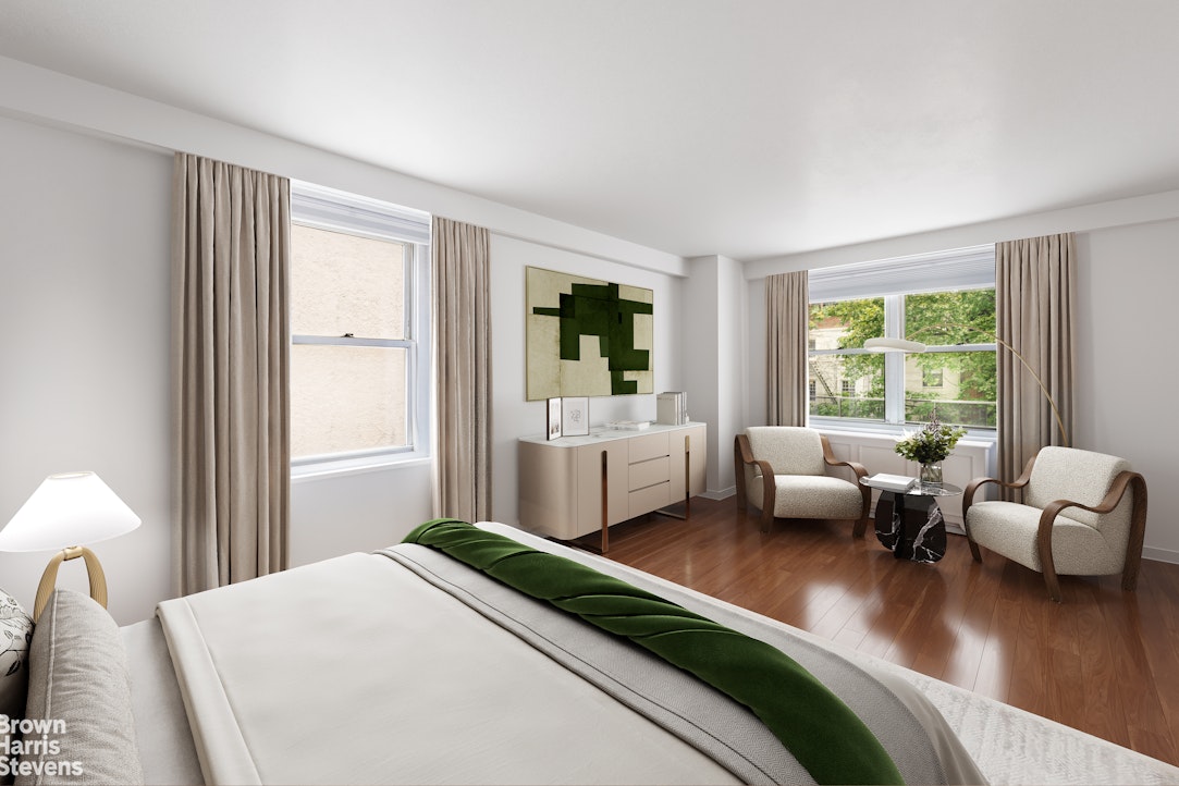 251 East 32nd Street, Unit 4J Manhattan, NY 10016 - Photo 4 of 15 a bedroom with a bed couch and two large window